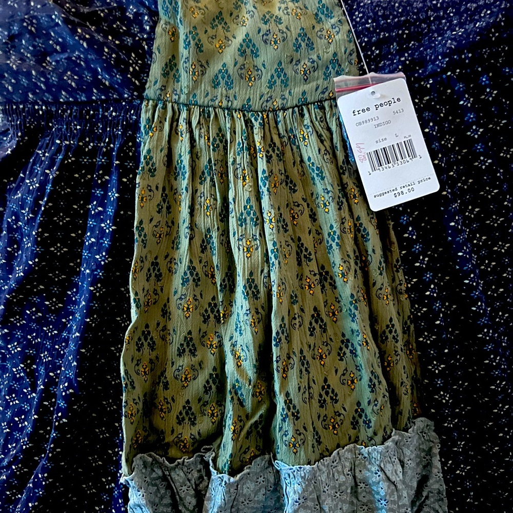 Free people sleeveless tunic size L new with tags.